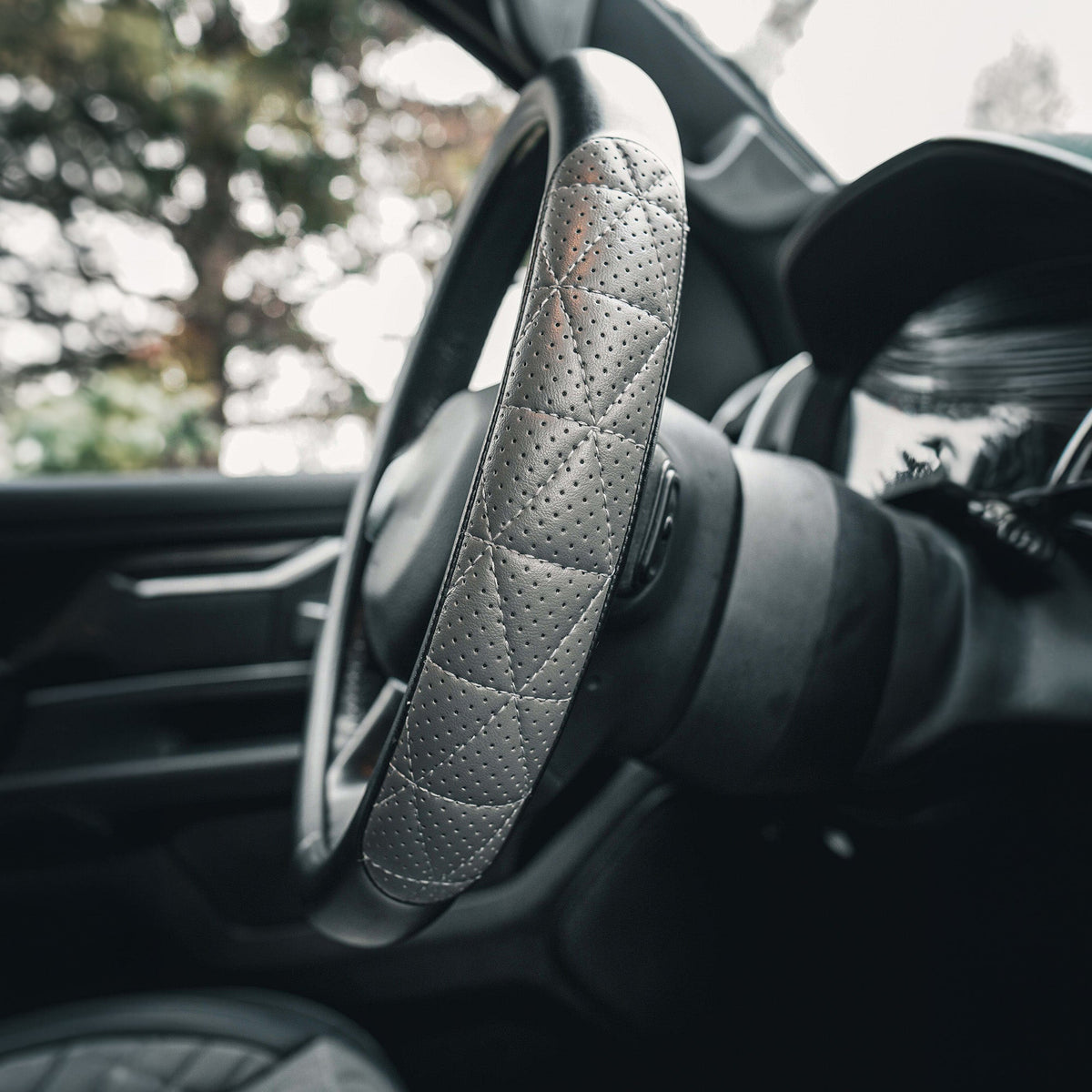 Steering wheel cover fitted inside a car