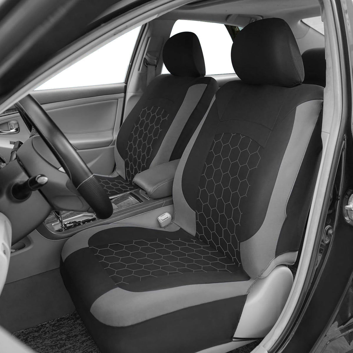Grey fabric seat covers installed in vehicle