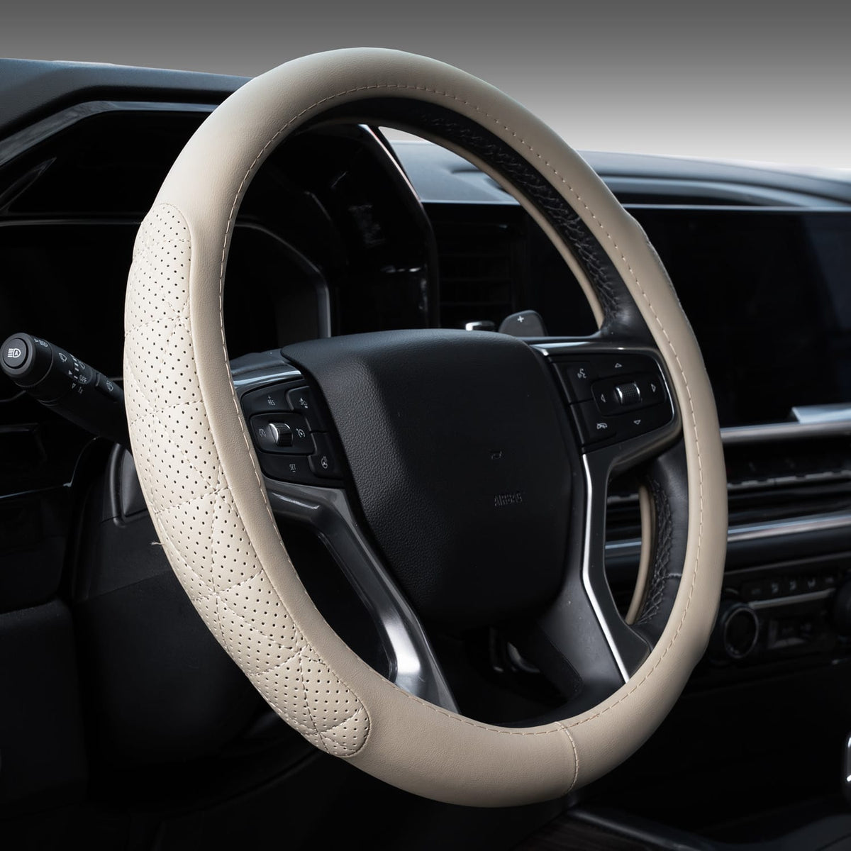 Solid beige eco-leather steering wheel cover fitted in a car